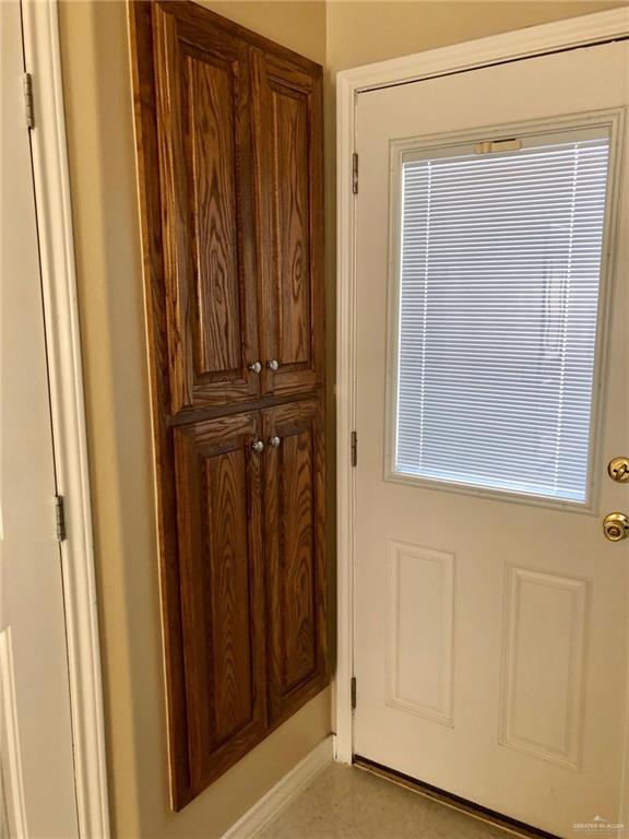 804 North Taylor Road, Unit 29 Mission, TX 78572 - Photo 8 of 27 a view of a door and a window