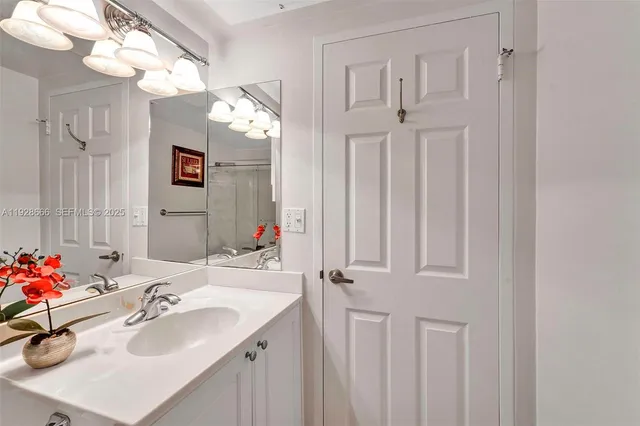 a bedroom with a bed a desk and chair