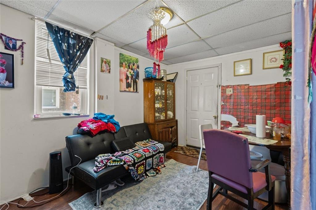107 Overbrook Boulevard Pittsburgh, PA 15210 - Photo 14 of 33 a living room with furniture and a window