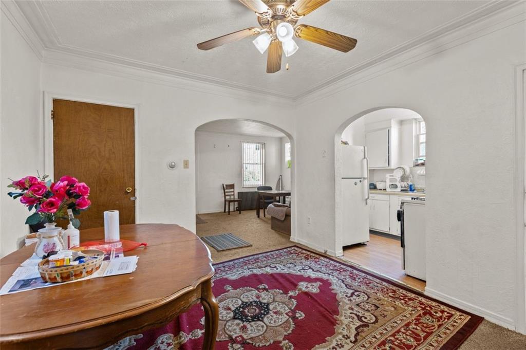 107 Overbrook Boulevard Pittsburgh, PA 15210 - Photo 25 of 33 a living room with furniture and flowers