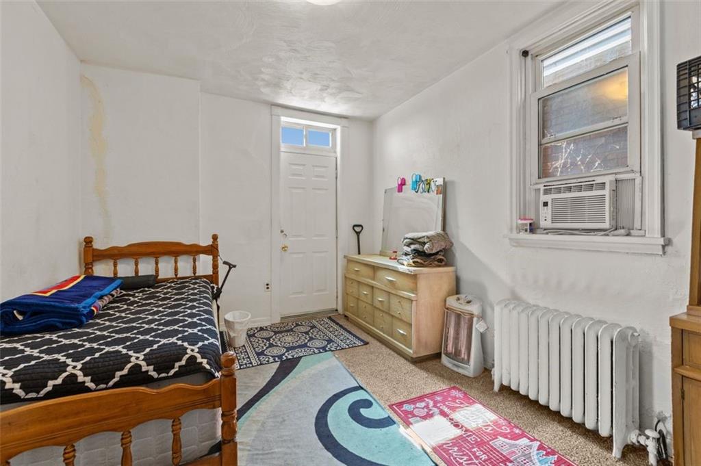 107 Overbrook Boulevard Pittsburgh, PA 15210 - Photo 31 of 33 a bedroom with furniture and a window