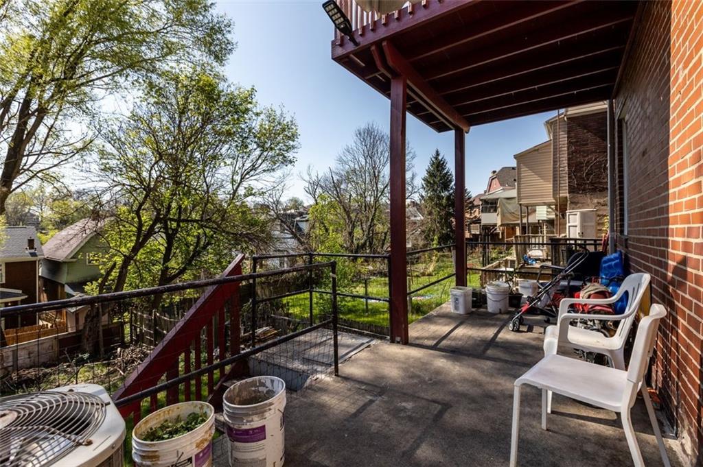 107 Overbrook Boulevard Pittsburgh, PA 15210 - Photo 4 of 33 a view of a chairs and table in the patio