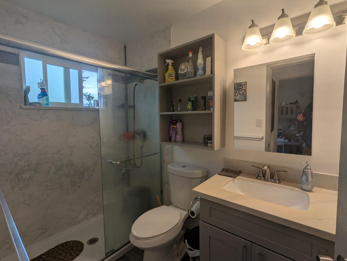 250 Schafer Road Hayward, CA 94544 - Photo 16 of 21 a bathroom with a sink toilet and shower