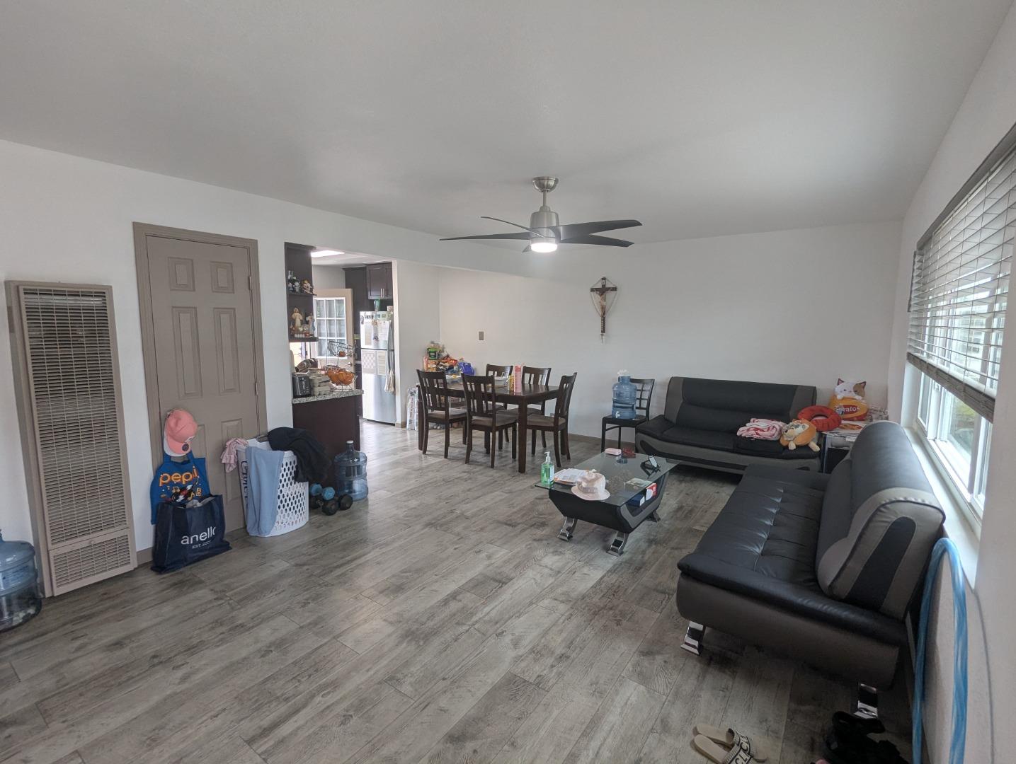 250 Schafer Road Hayward, CA 94544 - Photo 5 of 21 a living room with furniture and wooden floor