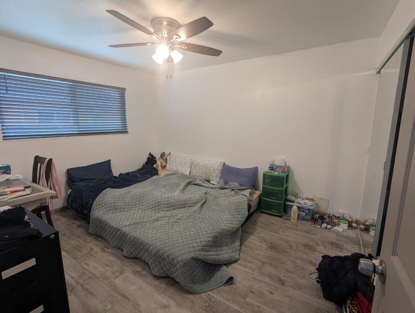 250 Schafer Road Hayward, CA 94544 - Photo 9 of 21 a bed room with a bed and a couch