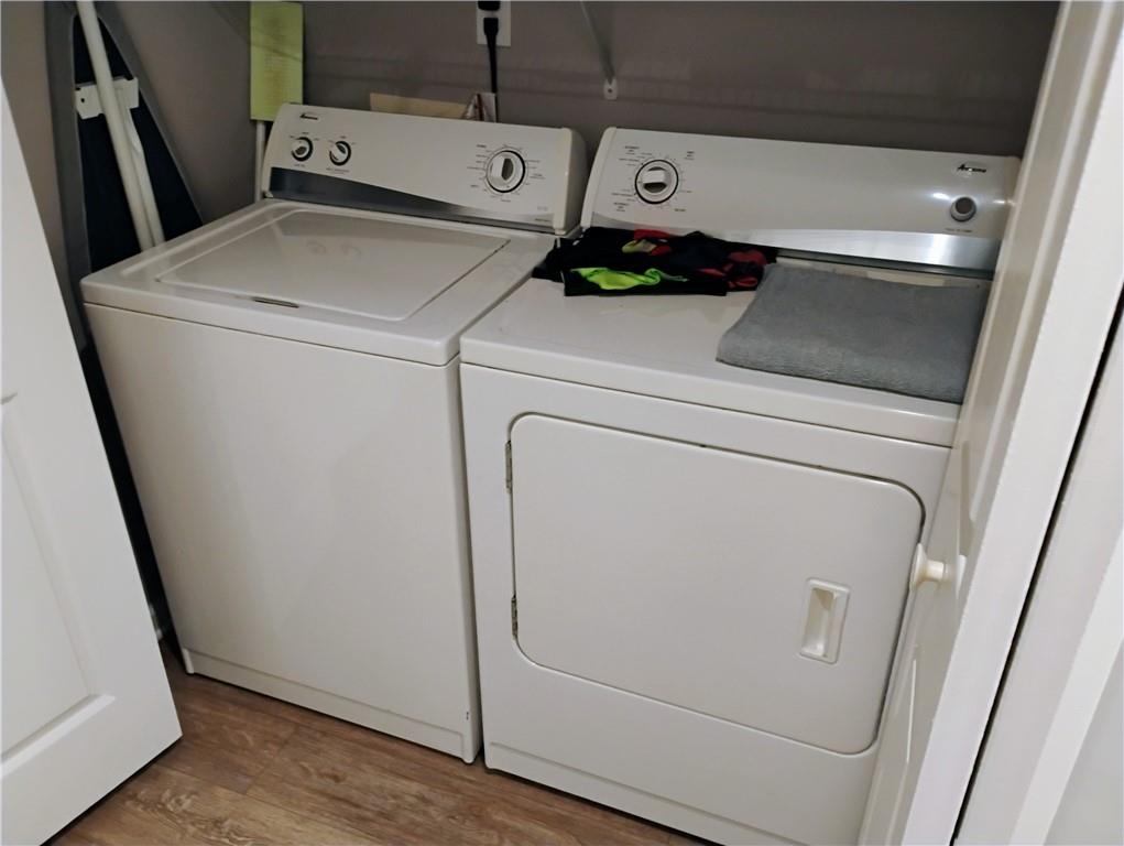 955 Juniper Street Northeast, Unit 4130 Atlanta, GA 30309 - Photo 13 of 15 a utility room with dryer and washer