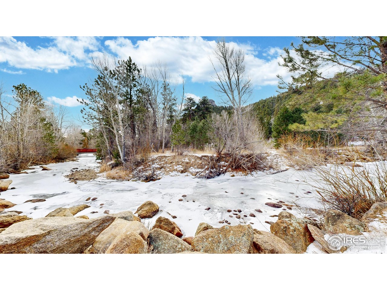 1280 Fall River Road, Unit 1 Estes Park, CO 80517 - Photo 10 of 29 River views right off of your deck