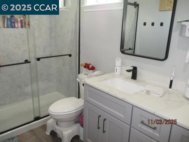 5751 Bridgehead Road Oakley, CA 94561 - Photo 11 of 14 a bathroom with a sink a toilet and shower