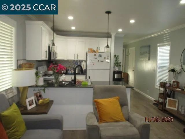 a living room with furniture and a couch