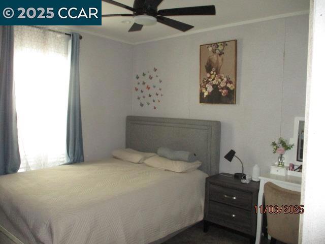 5751 Bridgehead Road Oakley, CA 94561 - Photo 10 of 14 a bedroom with a bed and a window