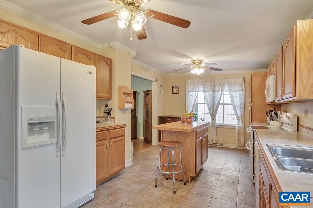 2406 Wakefield Road Charlottesville, VA 22901 - Photo 13 of 31 a kitchen with a refrigerator a sink and dishwasher