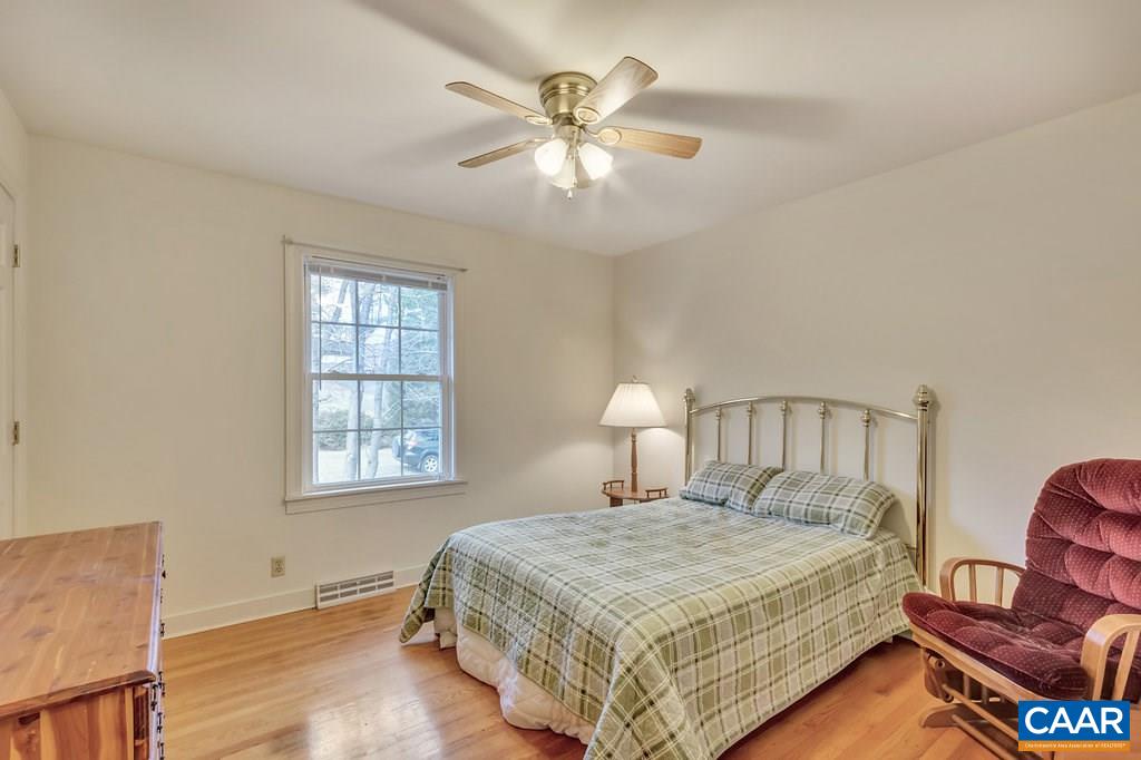 2406 Wakefield Road Charlottesville, VA 22901 - Photo 19 of 31 a bedroom with a bed and window