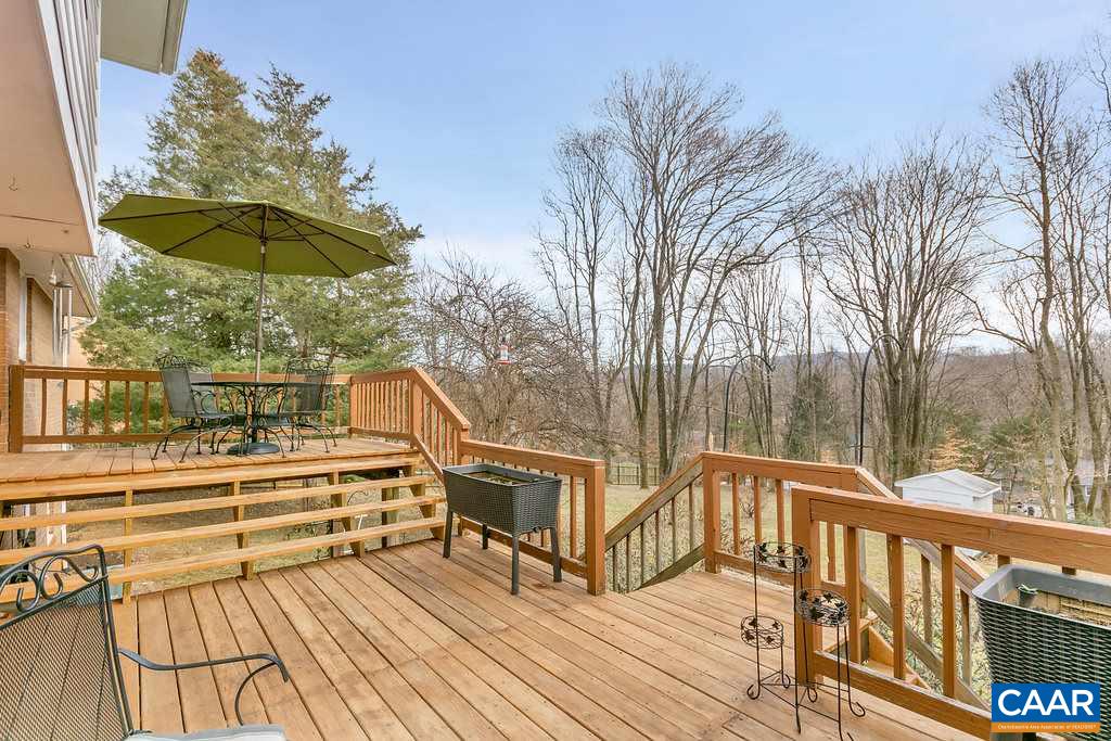 2406 Wakefield Road Charlottesville, VA 22901 - Photo 2 of 31 a view of a roof deck with wooden fence