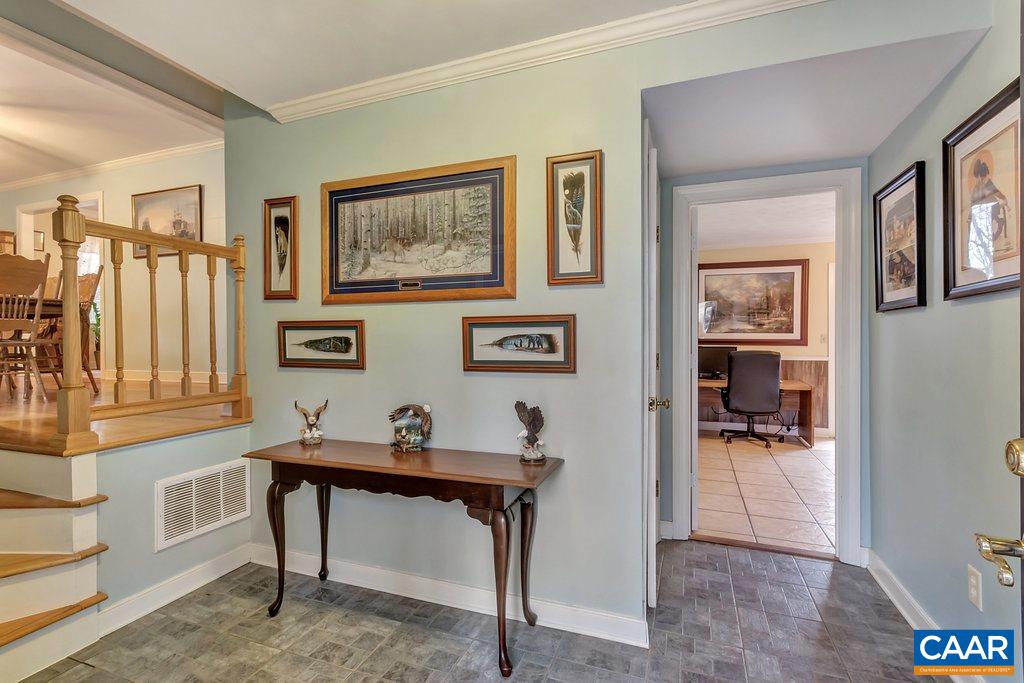 2406 Wakefield Road Charlottesville, VA 22901 - Photo 4 of 31 a workspace with furniture and window