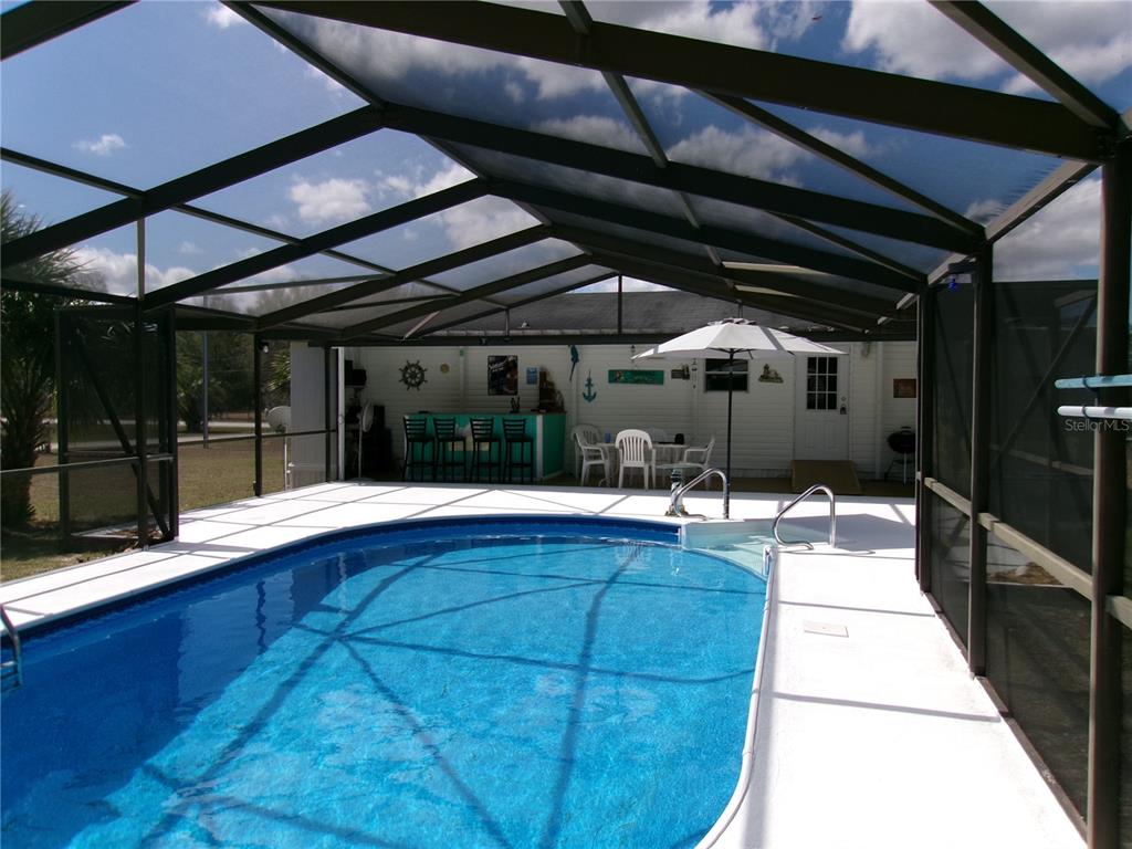 12525 Southeast 83rd Terrace Belleview, FL 34420 - Photo 21 of 47 a outdoor space with a tub