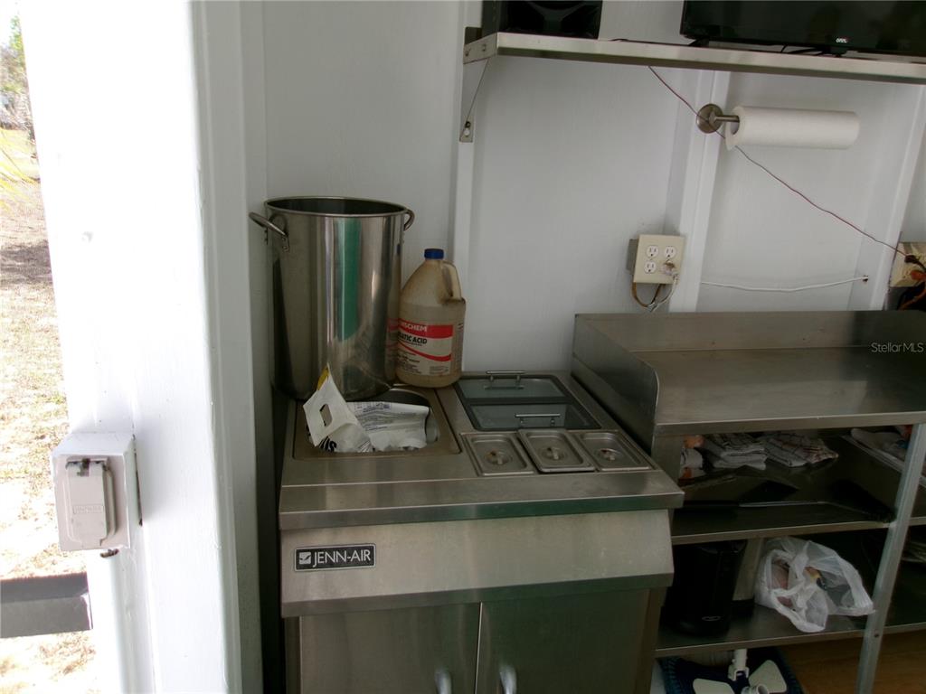 12525 Southeast 83rd Terrace Belleview, FL 34420 - Photo 28 of 47 a close view of water heater room