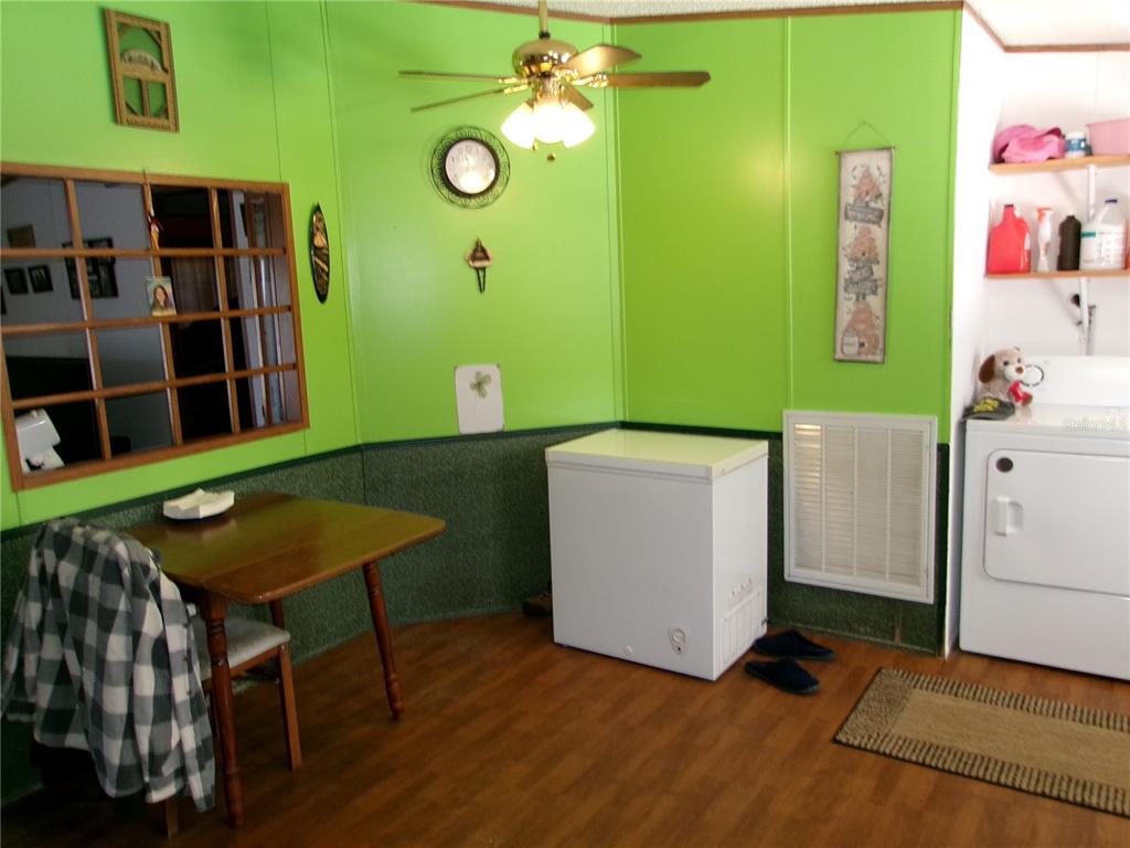 12525 Southeast 83rd Terrace Belleview, FL 34420 - Photo 30 of 47 a room with cabinets and furniture