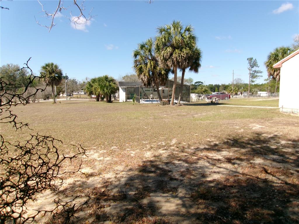 12525 Southeast 83rd Terrace Belleview, FL 34420 - Photo 4 of 47 a view of an ocean and beach