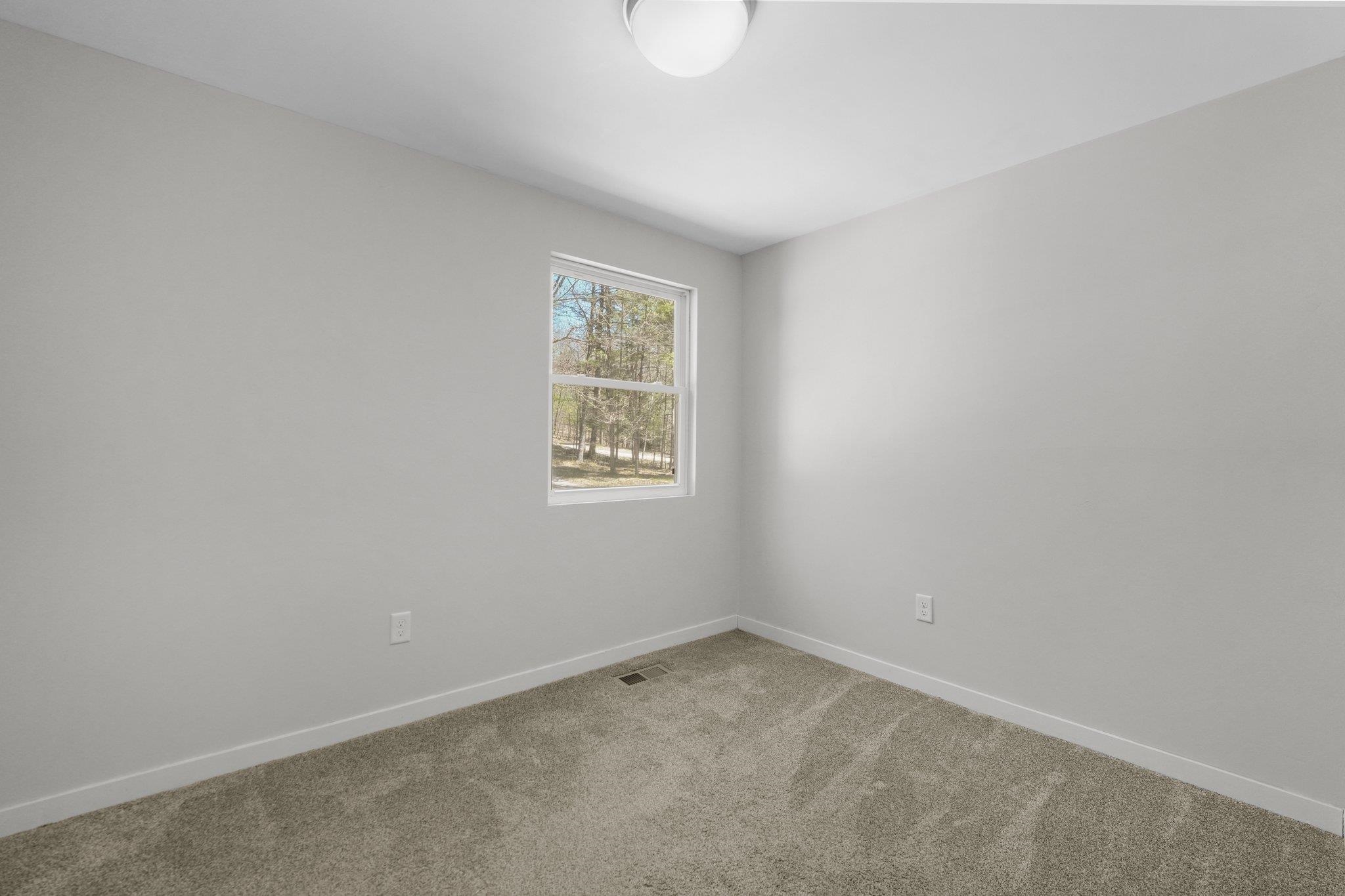 5410 Trager Road Traverse City, MI 49696 - Photo 16 of 45 1933753-739cd6fa-8a7f-40d7-83f4-7fe29683035a.JPG