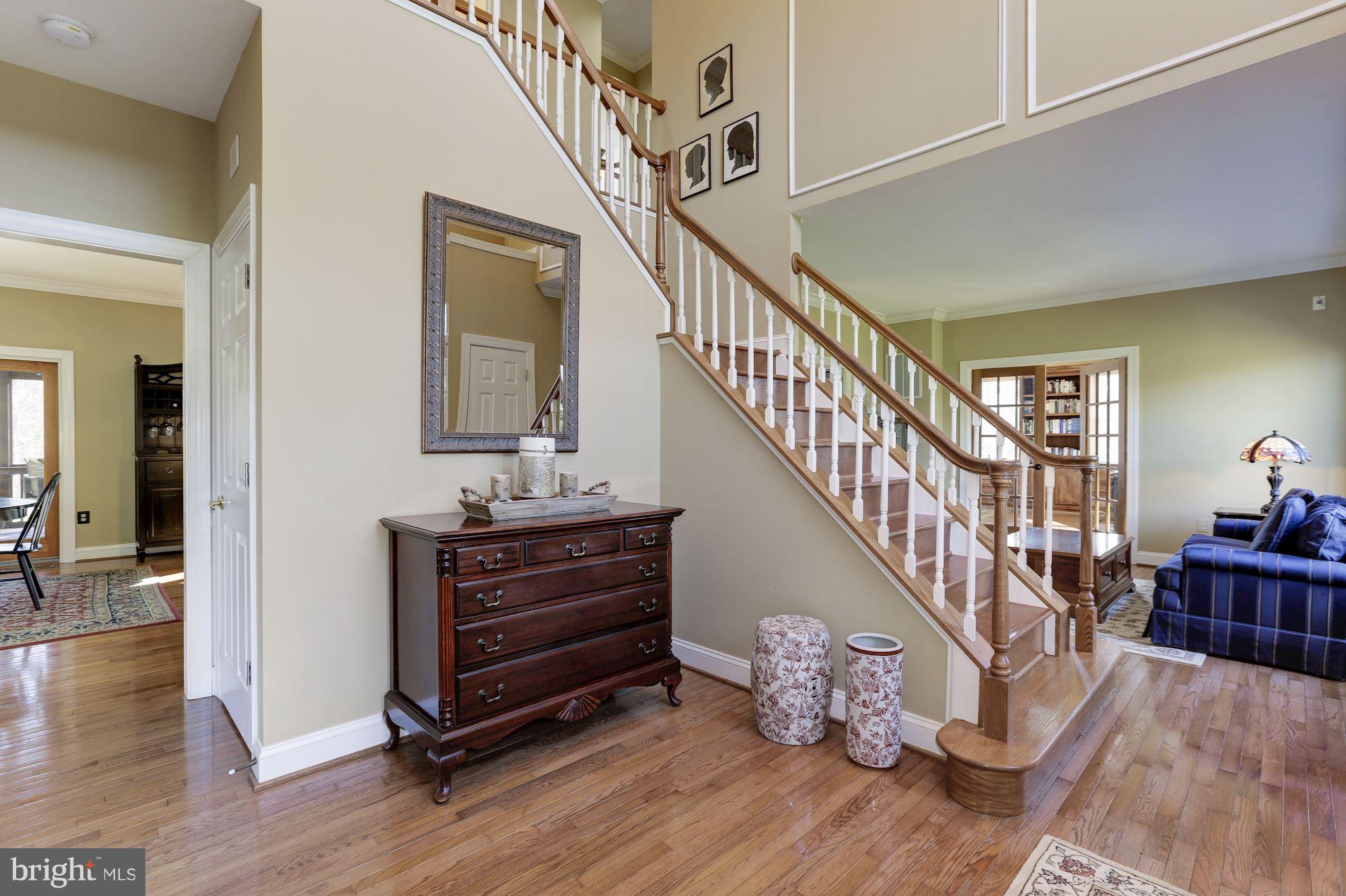 Two story foyer into breakfast area & living room