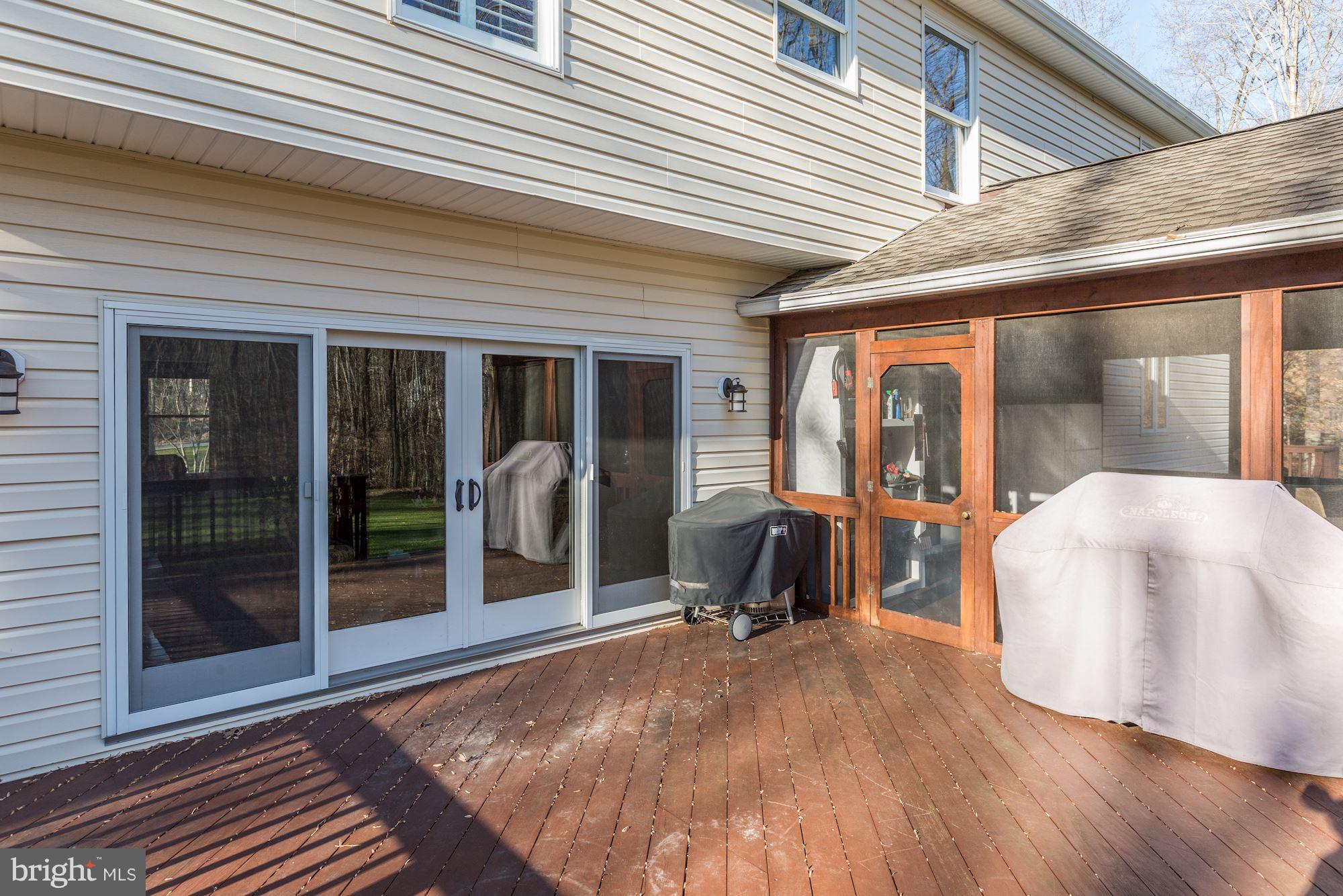 1705 Sinclair Road Gambrills, MD 21054 - Photo 69 of 82 Ipe Brazilian deck and screened-in porch