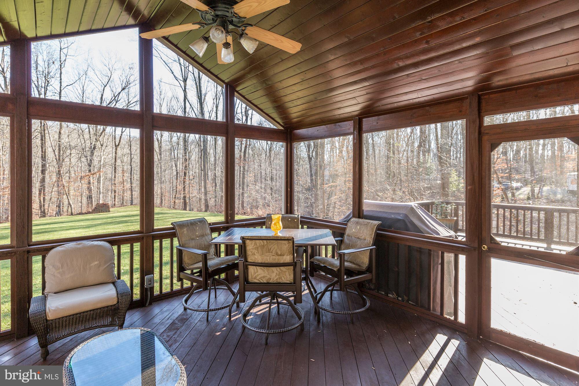 1705 Sinclair Road Gambrills, MD 21054 - Photo 74 of 82 Screened in porch with deck access