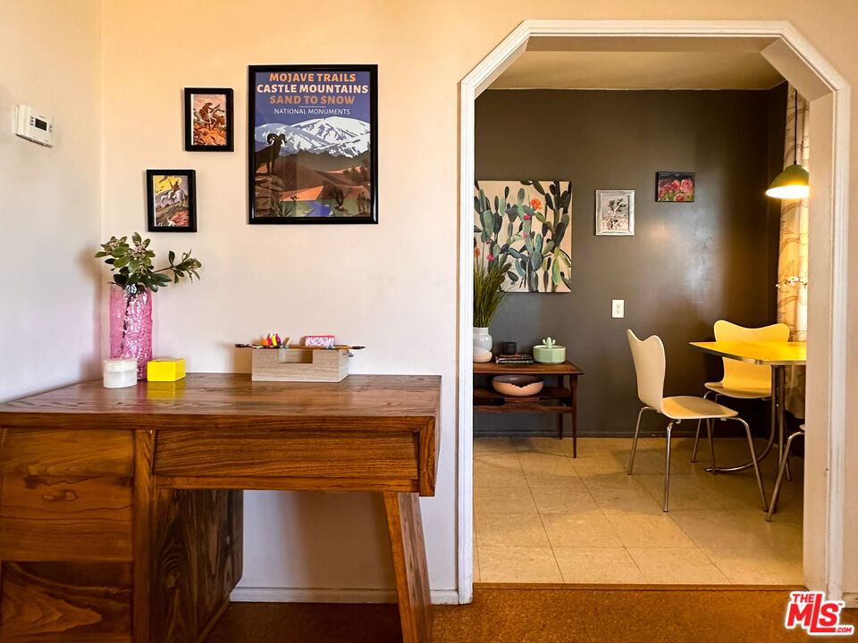 61855 Valley View Circle Joshua Tree, CA 92252 - Photo 16 of 59 a living room with furniture and a potted plant