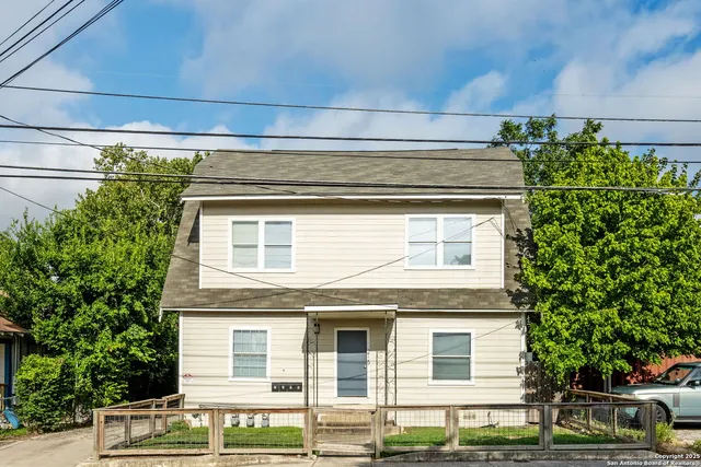 a view of a house with a garage