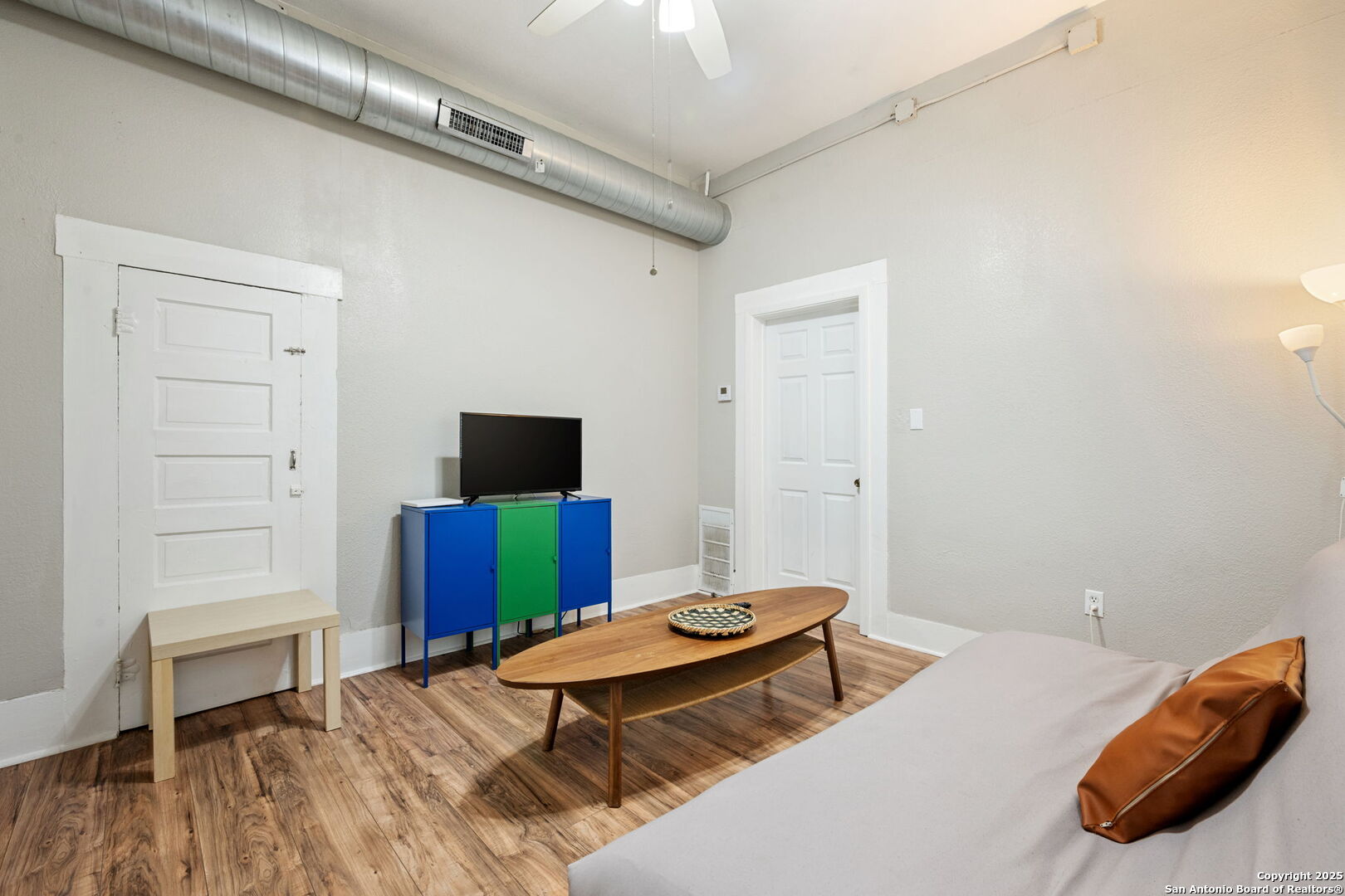 215 Blanco Road San Antonio, TX 78212 - Photo 12 of 48 a bedroom with a bed and a television