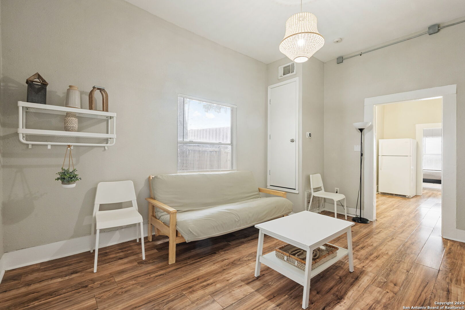 215 Blanco Road San Antonio, TX 78212 - Photo 20 of 48 a living room with furniture a window and wooden floor