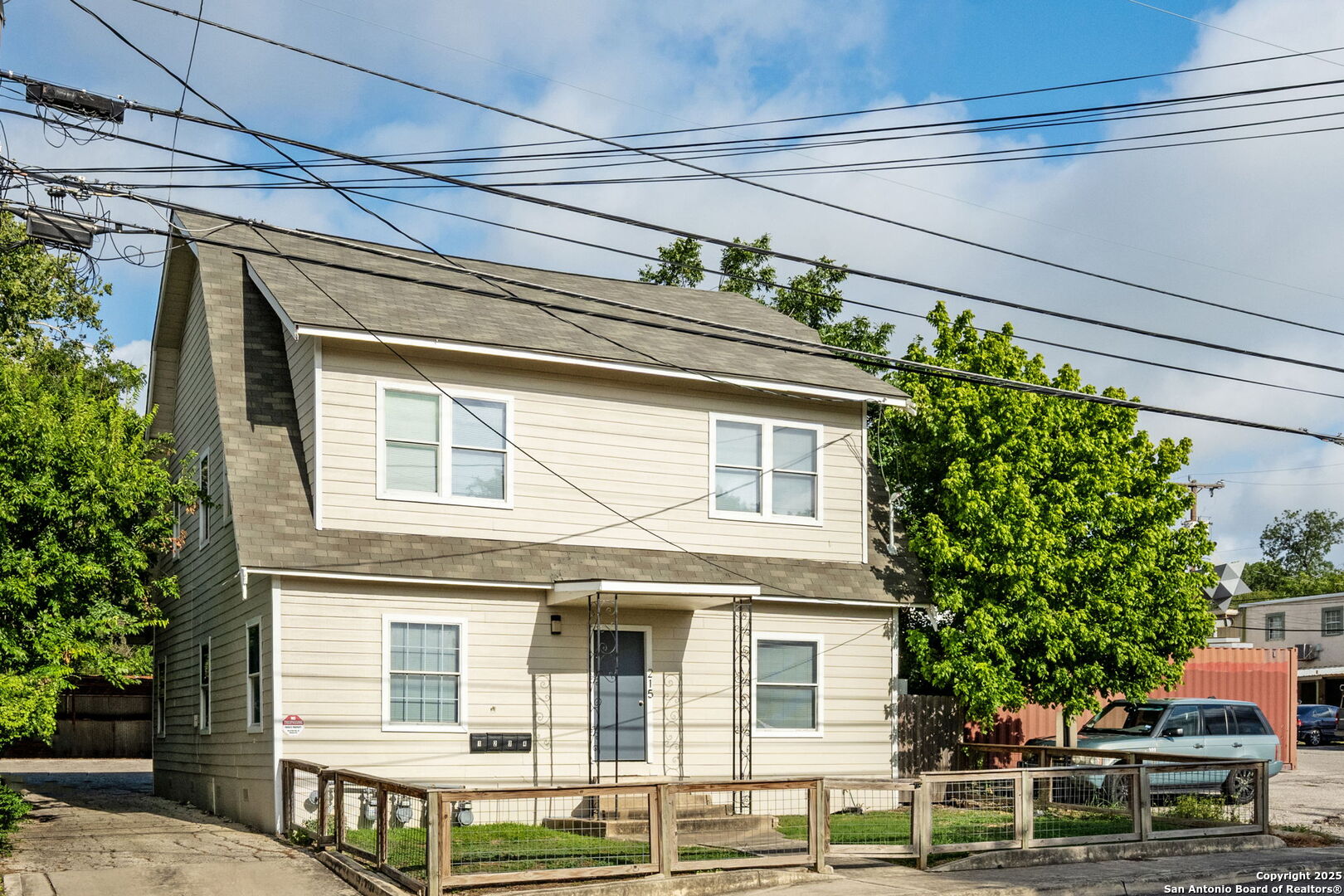 215 Blanco Road San Antonio, TX 78212 - Photo 2 of 48 a front view of a house with a garden