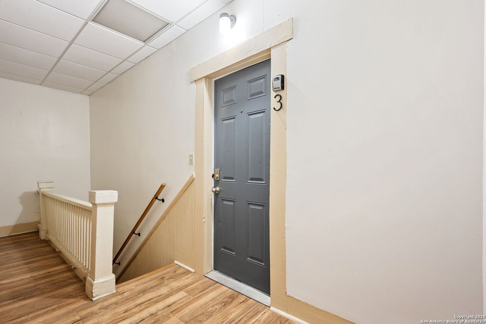 215 Blanco Road San Antonio, TX 78212 - Photo 28 of 48 a view of a hallway with wooden floor and staircase