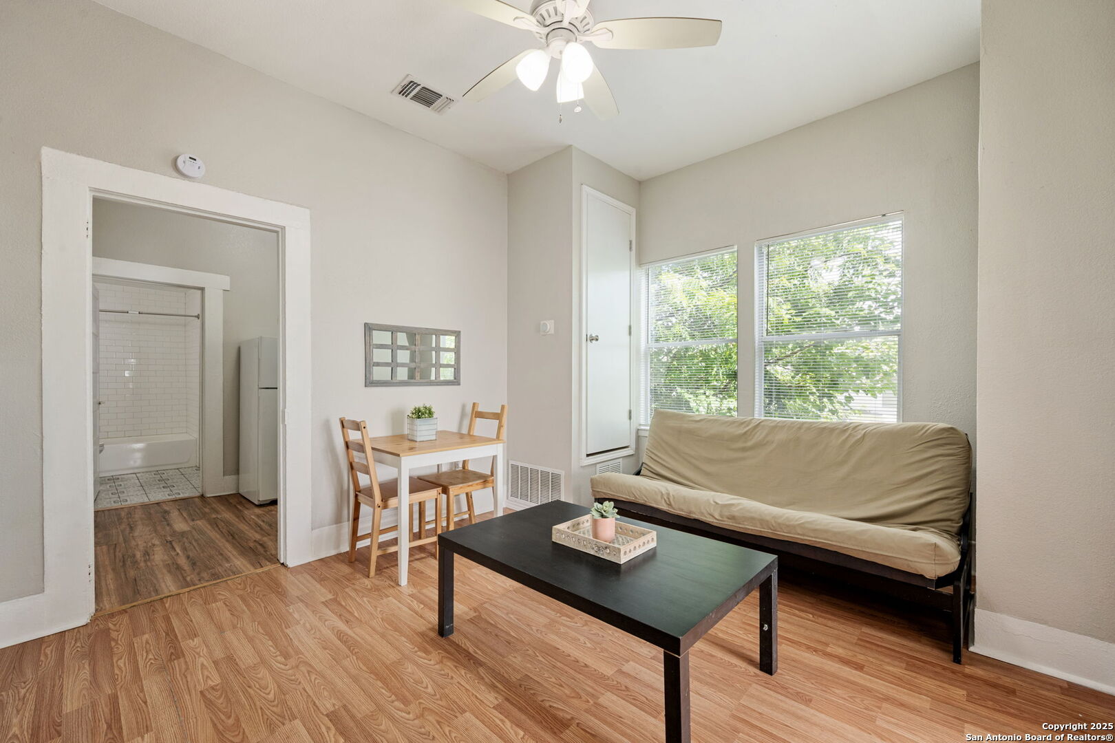215 Blanco Road San Antonio, TX 78212 - Photo 41 of 48 a living room with a window and a table