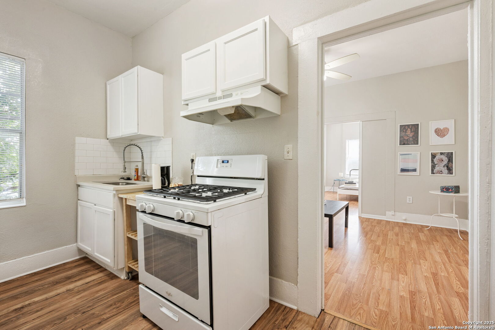 215 Blanco Road San Antonio, TX 78212 - Photo 42 of 48 a kitchen with a stove and a refrigerator