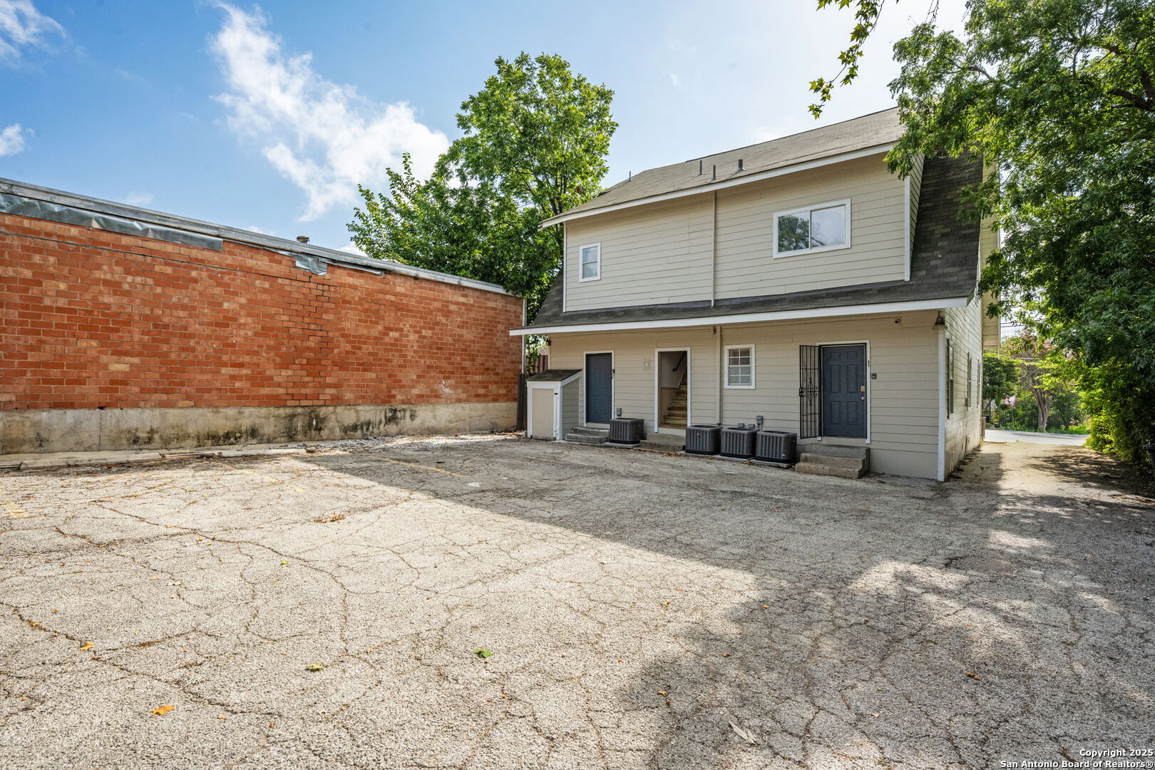 215 Blanco Road San Antonio, TX 78212 - Photo 6 of 48 a view of a house with a backyard