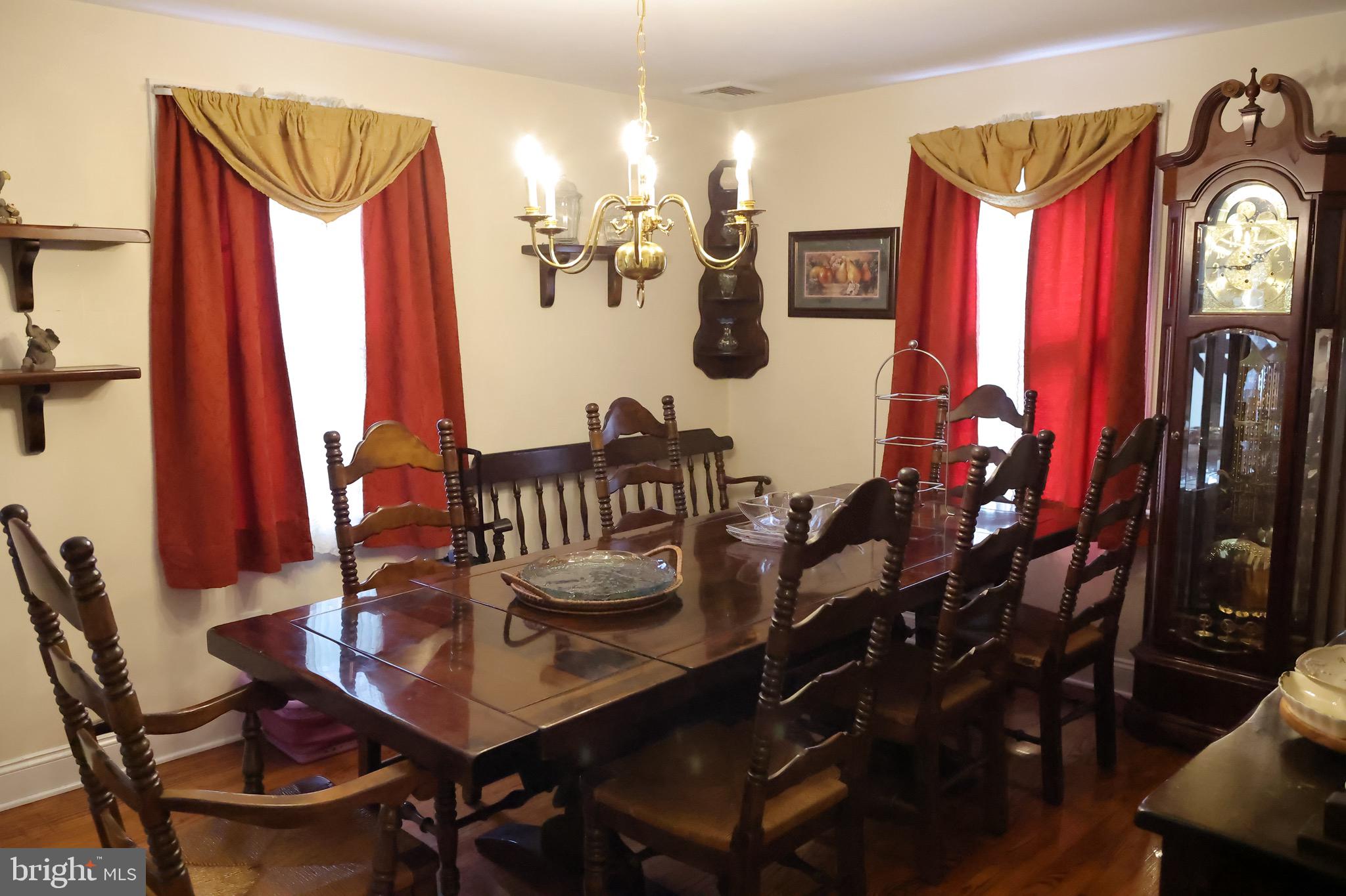 1784 Old Trenton Road West Windsor, NJ 08550 - Photo 19 of 29 a view of a dining room with furniture and chandelier