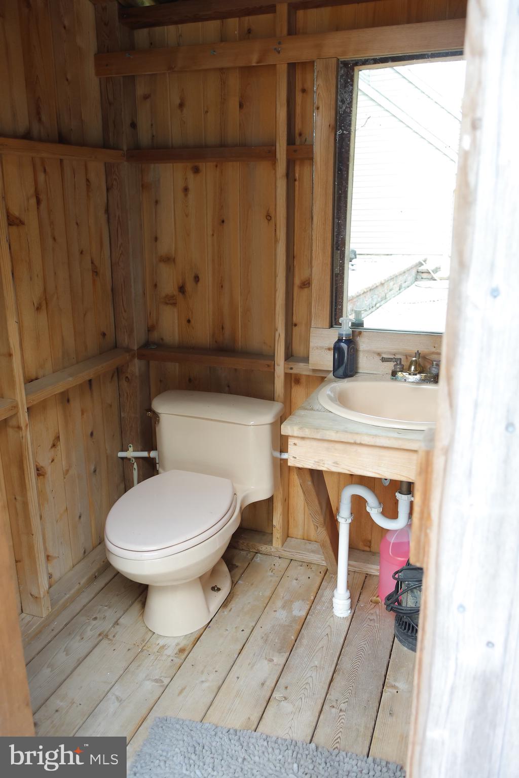 1784 Old Trenton Road West Windsor, NJ 08550 - Photo 7 of 29 a bathroom with a toilet a sink and a mirror