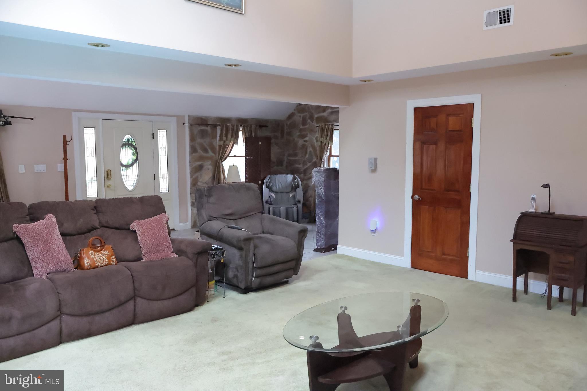 1784 Old Trenton Road West Windsor, NJ 08550 - Photo 9 of 29 a living room with furniture and a potted plant