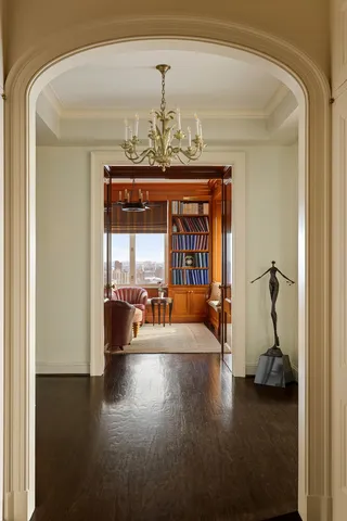 a kitchen with a sink cabinets and a table