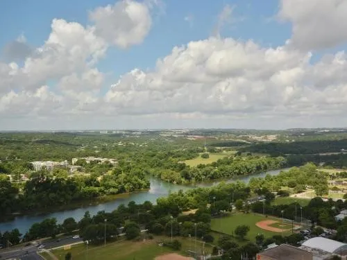 a view of lake with green space