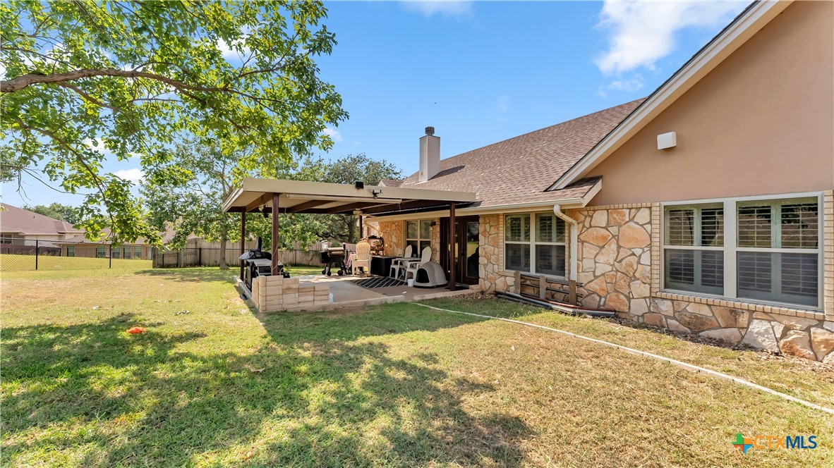 306 Alexander Avenue Burnet, TX 78611 - Photo 34 of 38 a view of a house with swimming pool and sitting area