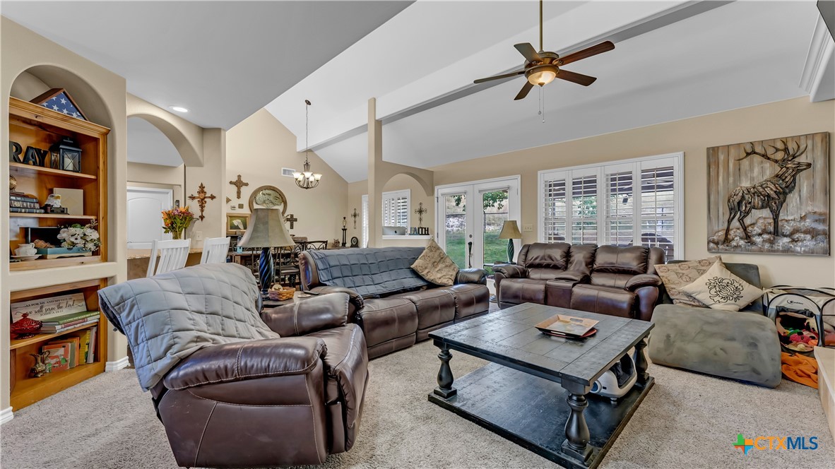 306 Alexander Avenue Burnet, TX 78611 - Photo 5 of 38 a living room with furniture a rug and a window