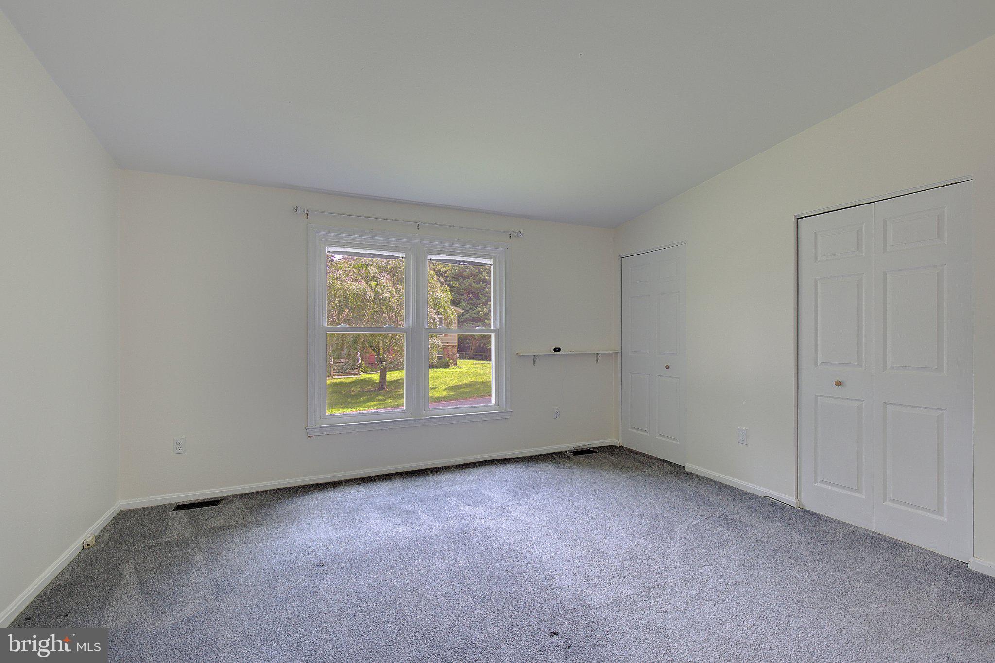 1111 Redeye Road Lusby, MD 20657 - Photo 18 of 24 Bright and airy room with garden view.