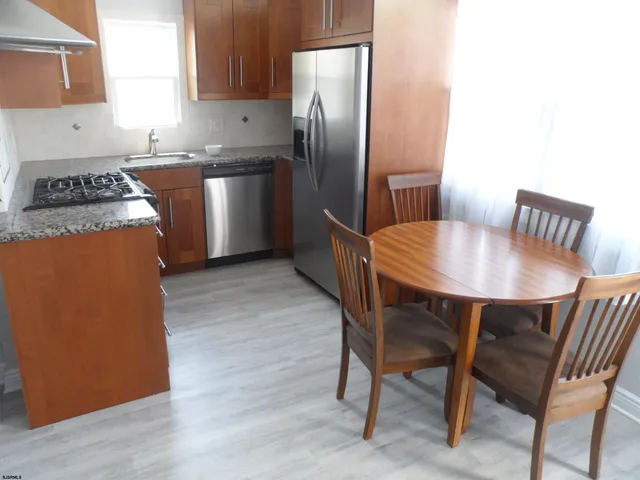 a view of balcony with furniture