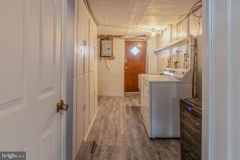 739 Fairfax Road Drexel Hill, PA 19026 - Photo 16 of 18 a bathroom with a shower a mirror and a sink