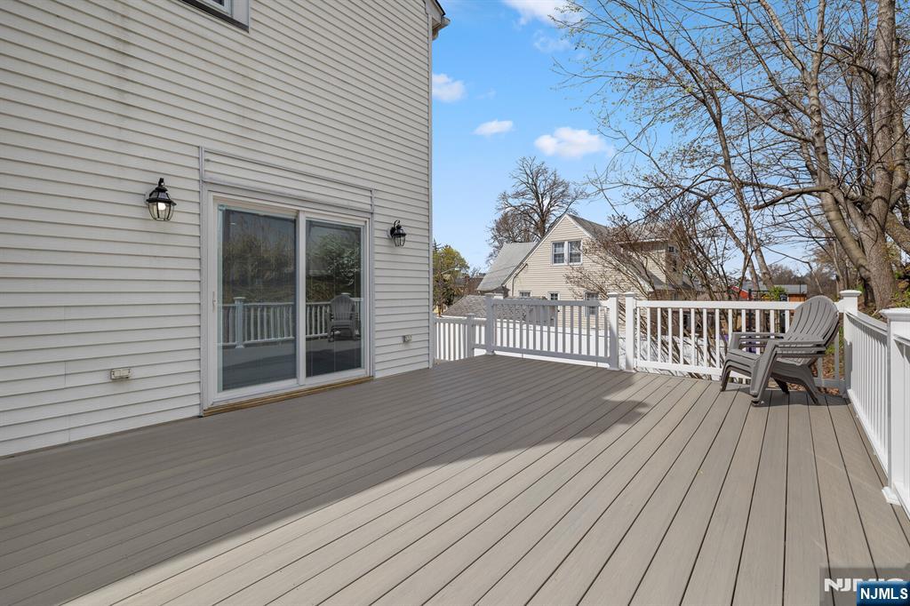 346 Carmita Avenue Rutherford, NJ 07070 - Photo 35 of 47 a view of backyard with deck and wooden floor