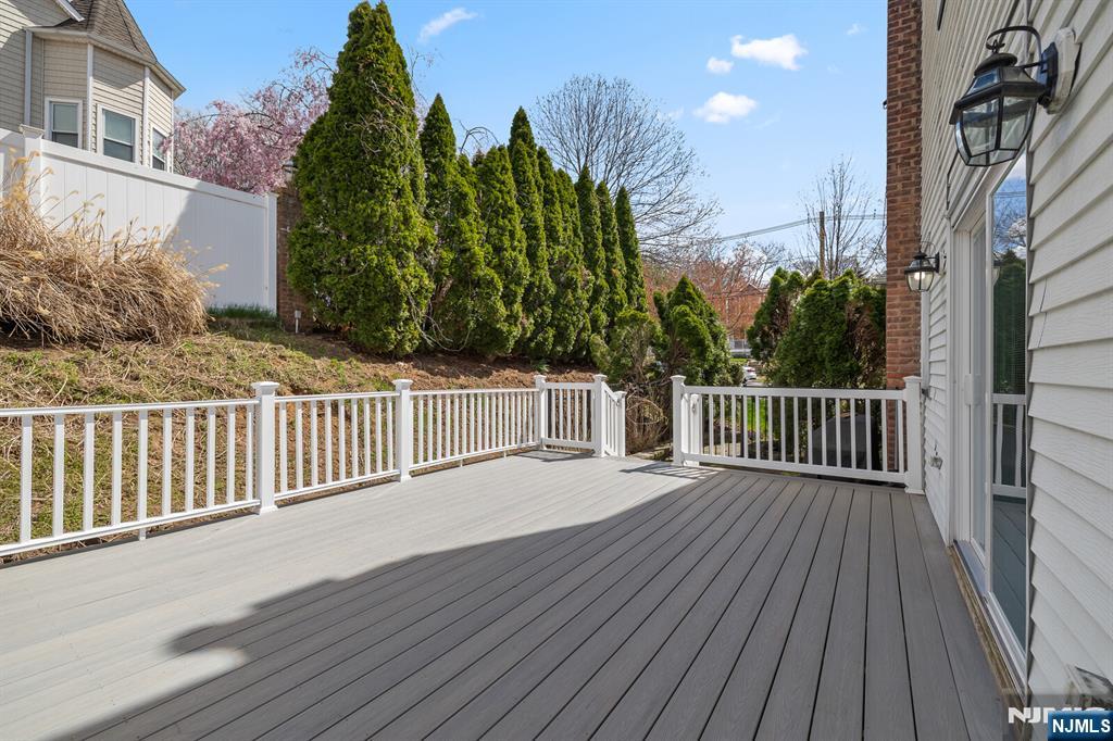 346 Carmita Avenue Rutherford, NJ 07070 - Photo 37 of 47 a view of a wooden roof deck