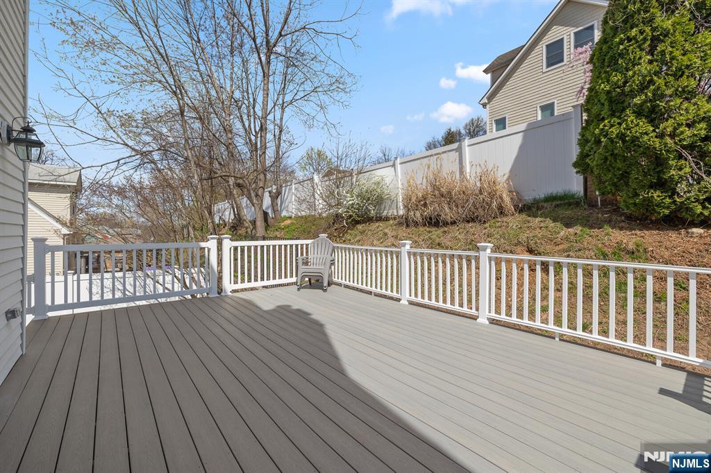 346 Carmita Avenue Rutherford, NJ 07070 - Photo 40 of 47 a view of deck with wooden floor and fence