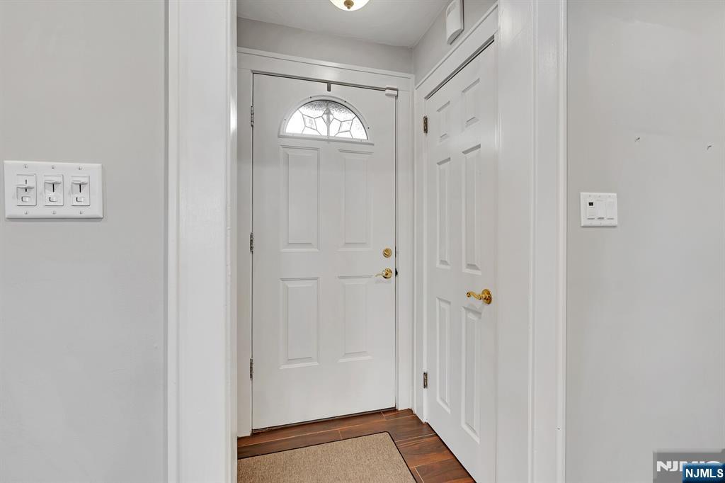 346 Carmita Avenue Rutherford, NJ 07070 - Photo 4 of 47 a view of a hallway with wooden floor