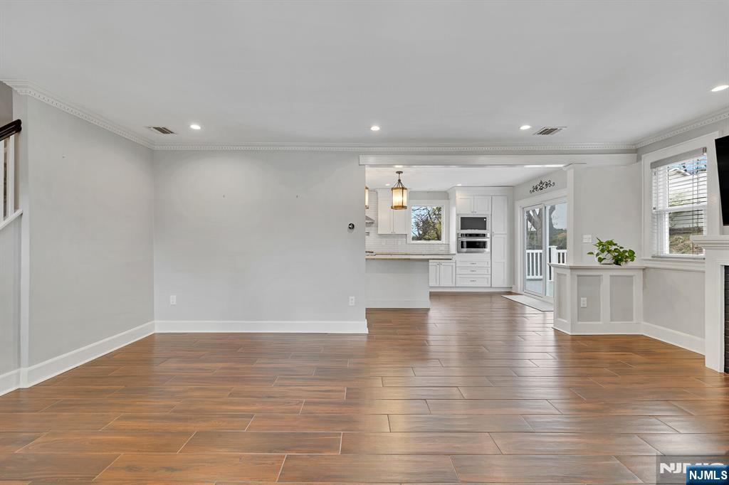 346 Carmita Avenue Rutherford, NJ 07070 - Photo 5 of 47 a view of empty room with wooden floor